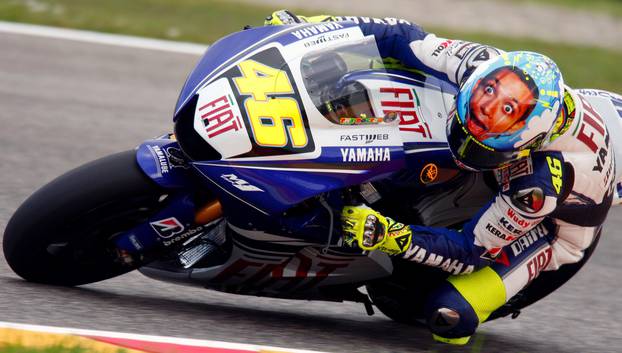 FILE PHOTO: Yamaha MotoGP rider Rossi of Italy rides during a free practice session for the MotoGP Italian Grand Prix at Mugello