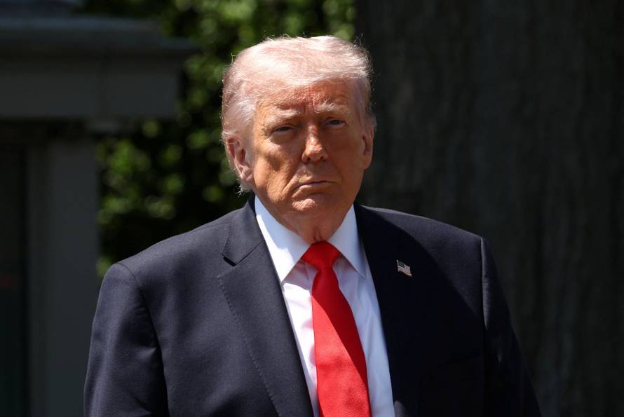 U.S. President Donald Trump departs the White House in Washington
