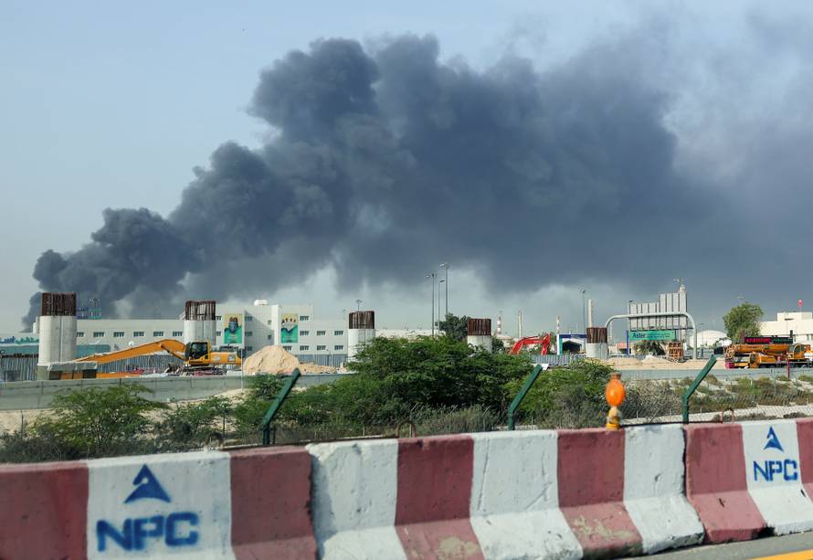 Smoke billows from Jebel Ali port after an Iranian attack, following United States and Israel strikes on Iran, in Dubai