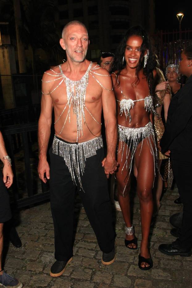 Vincent Cassel and his girlfriend, Narah Baptista, rock minimal looks at a Carnaval party in Rio!
