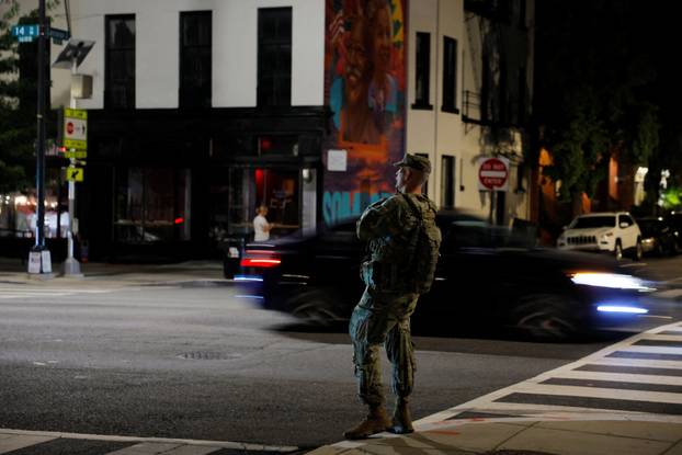 Members of the Ohio National Guard wear their sidearms while patrolling in Washington