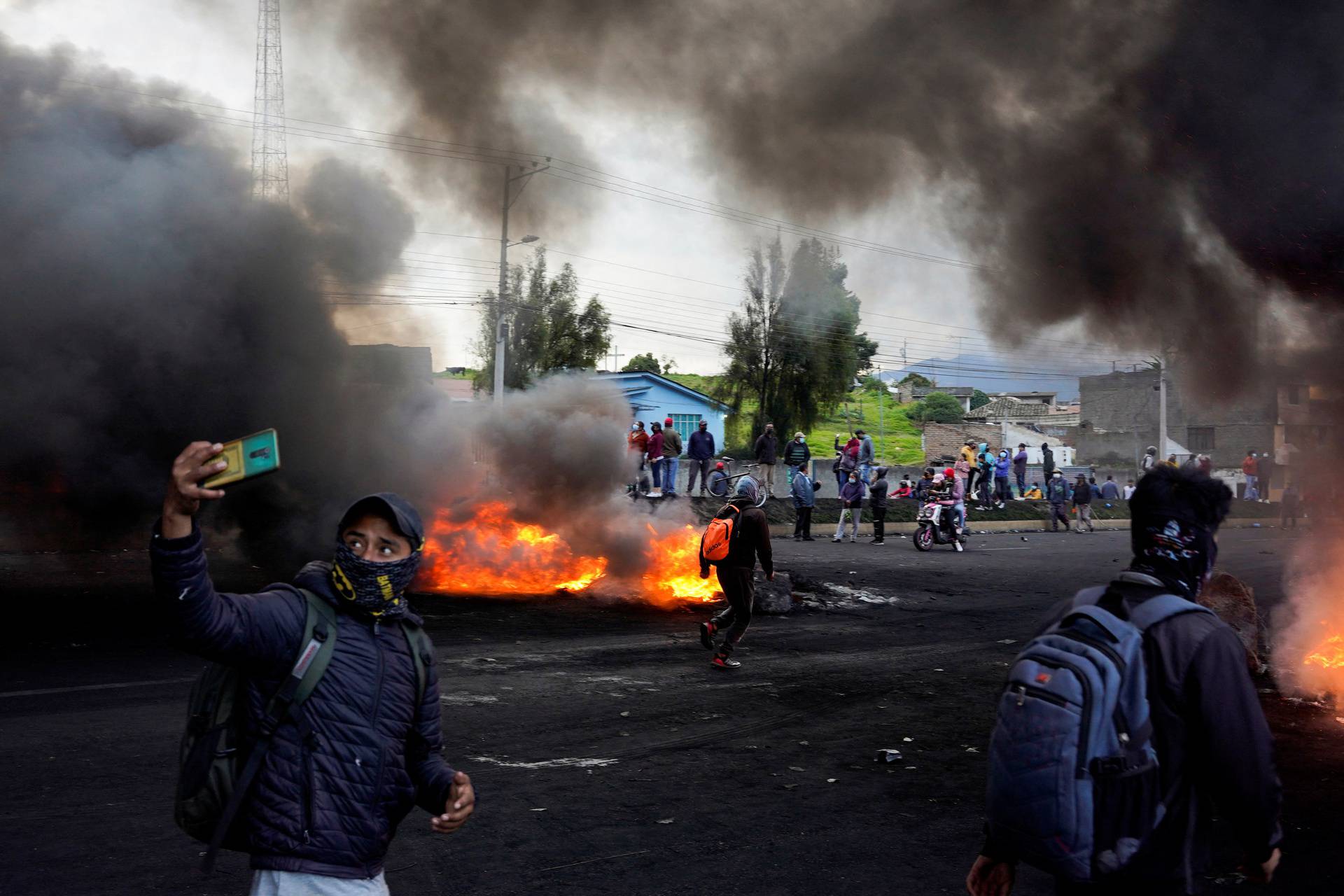 Indigenous demonstrators march towards Quito after a week of protests against Ecuadoran President  Lasso, in Machachi