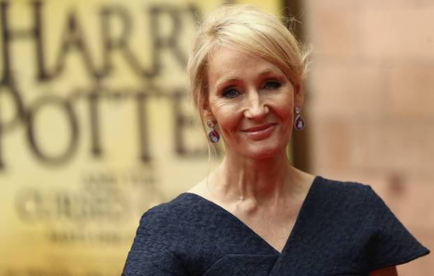 Author J.K. Rowling poses for photographers at a gala performance of the play Harry Potter and the Cursed Child parts One and Two in London