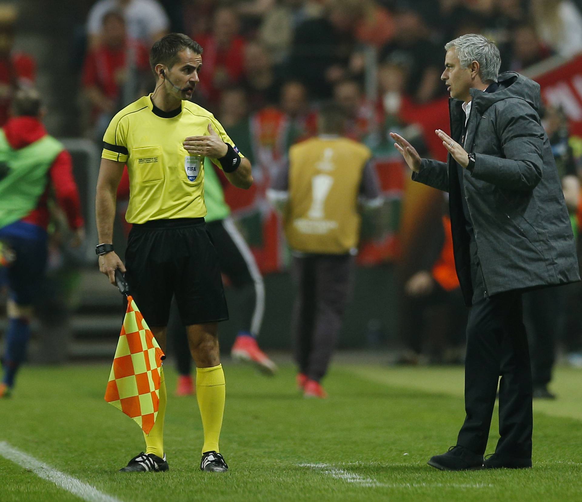 Manchester United manager Jose Mourinho with the assistant referee
