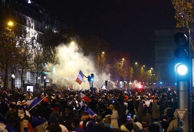 FIFA World Cup Final Qatar 2022 - France fans react on the Champs-Elysees during the final between France and Argentina