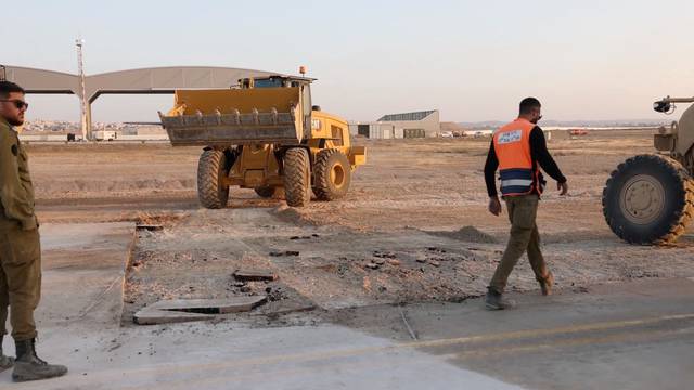 A view of a damaged area at a location given as Nevatim Airbase