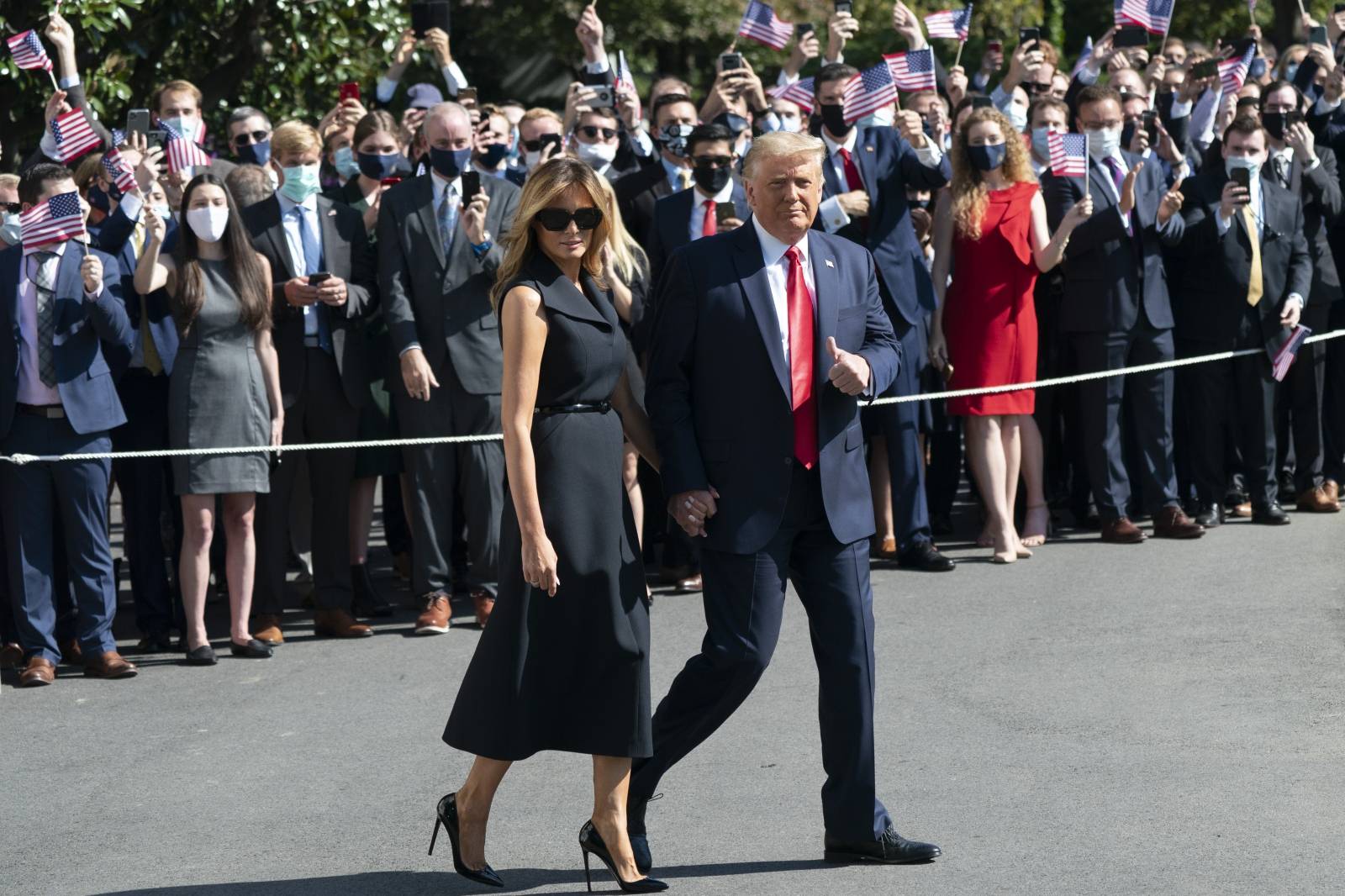 President Donald J. Trump  and First lady Melania Trump depart the White House