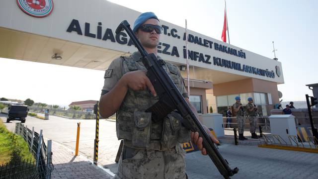 A Turkish soldier stands guard in front of the Aliaga Prison and Courthouse complex in Izmir