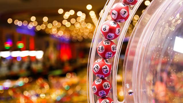 Red,Lottery,Balls,In,A,Bingo,Machine.gambling,Machine,And,Euqipment.