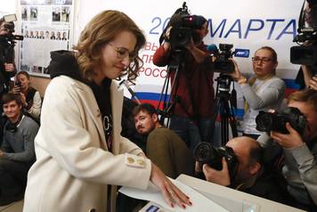 Presidential candidate Sobchak casts a ballot at a polling station during the presidential election in Moscow