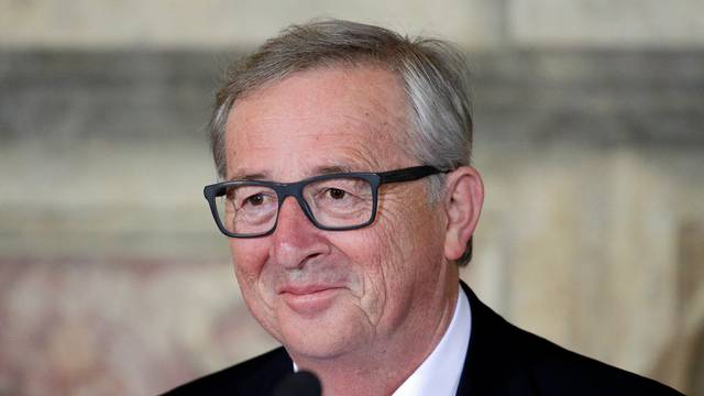 European Commission President Juncker looks on during a meeting at the Capitol Hill in Rome