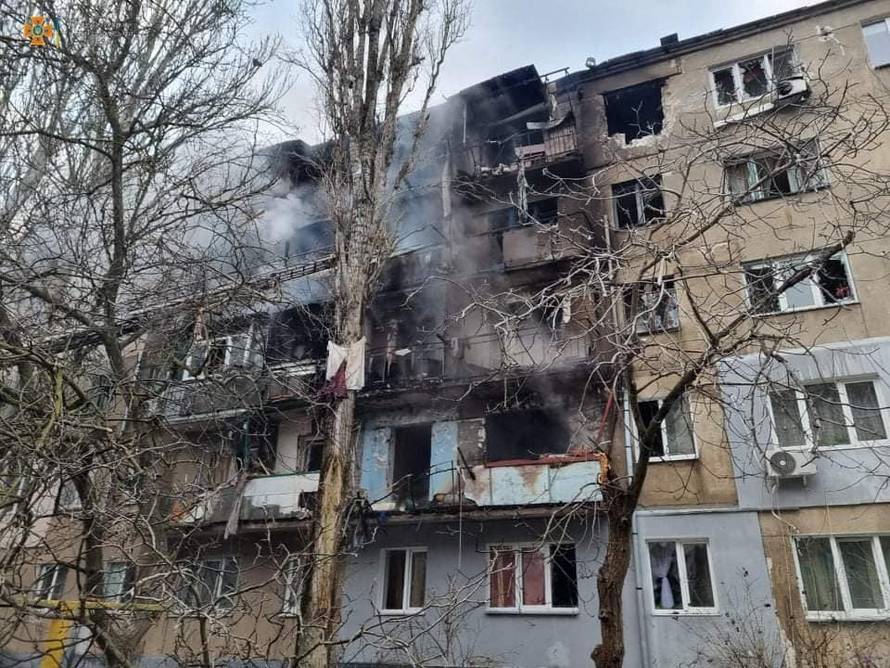 A view shows a residential building damaged by shelling in Mykolaiv