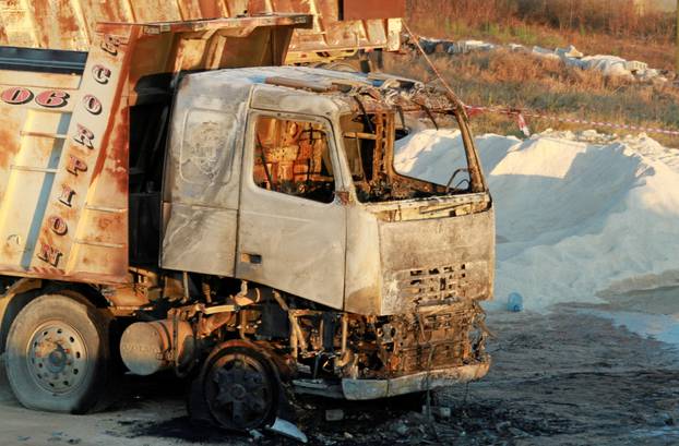 A burnt truck is seen at the site of a fuel tank explosion in Akkar