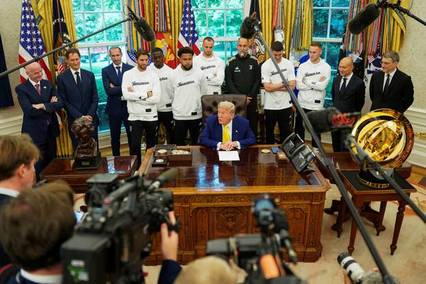 U.S. President Donald Trump meets with players of the Juventus soccer team at the White House in Washington