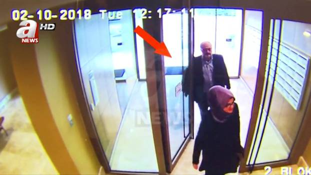 Still image taken from CCTV video supports to show Khashoggi and his fiancee entering their residence