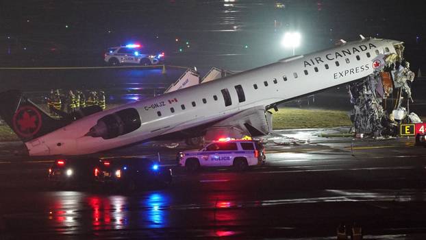 Air Canada Express jet collides with a ground vehicle at LaGuardia airport