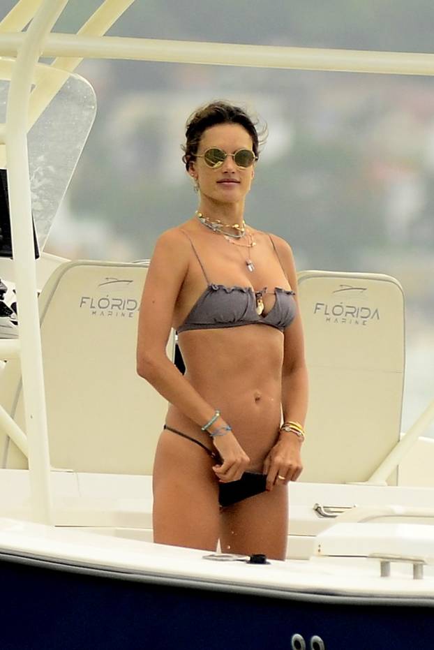 Alessandra Ambrosio enjoys day out on speedboat, plays beach tennis Florianopolis.