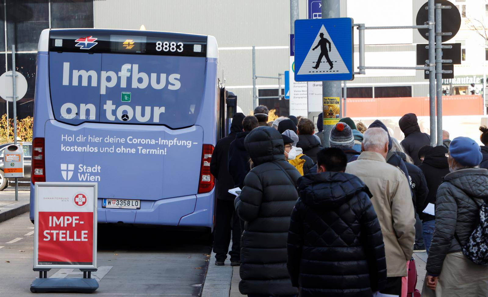 People queue up for vaccination in Vienna