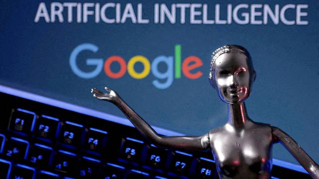 FILE PHOTO: Illustration shows Google logo and AI Artificial Intelligence words