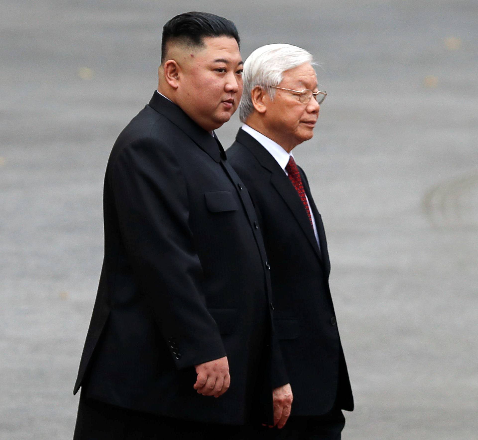 North Korea's leader Kim Jong Un attends a welcoming ceremony at the Presidential Palace in Hanoi