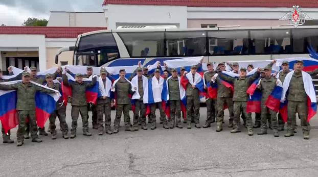 Russian POWs board bus in Belarus after release from Ukraine
