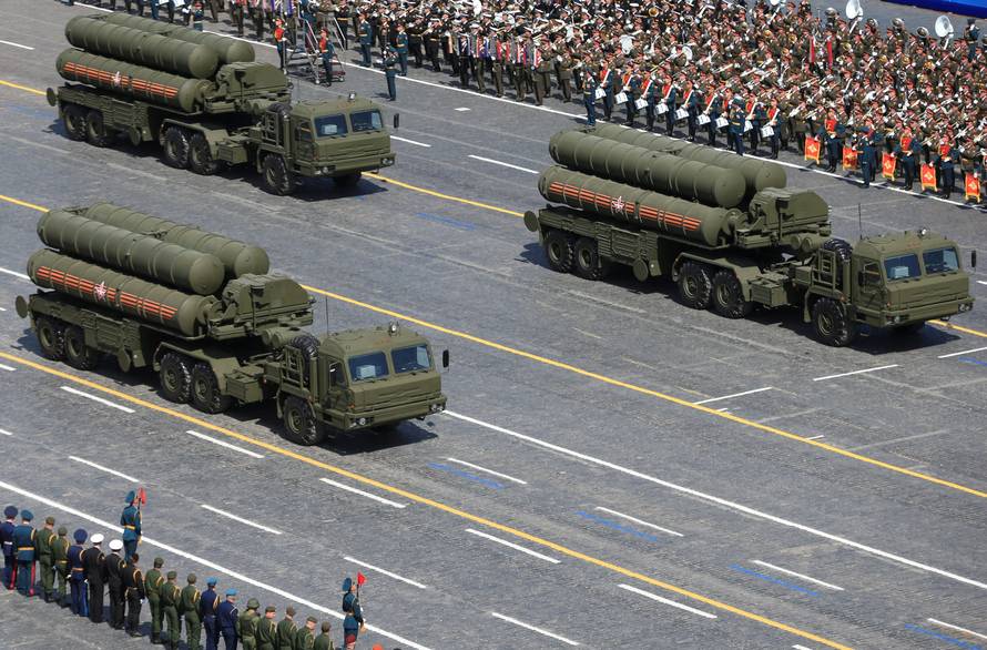 FILE PHOTO: RuRussian S-400 Triumph/SA-21 Growler medium-range and long-range surface-to-air missile systems drive during the Victory Day parade at Red Square in Moscow