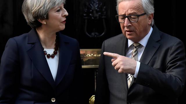 Britain's Prime Minister Theresa May welcomes Head of the European Commission, President Juncker to Downing Street in London