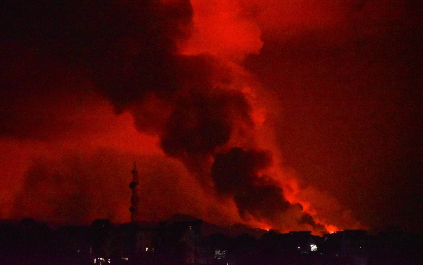 A general view shows smoke and flames at the volcanic eruption of Mount Nyiragongo near Goma