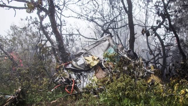 Rescue team works following a crash of a helicopter carrying Iran's President Ebrahim Raisi, in Varzaqan