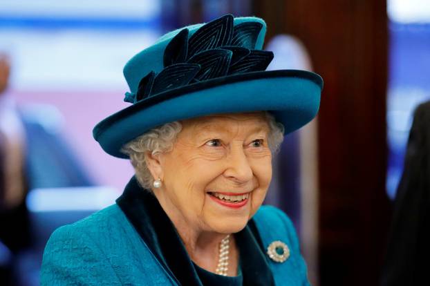 Britain's Queen Elizabeth visits the Royal Philatelic Society in London