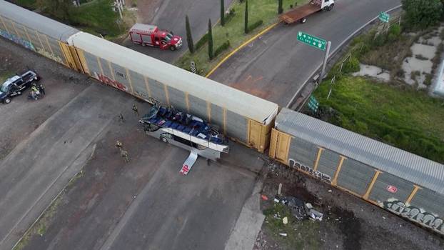 Aftermath of fatal bus-train collision in Atlacomulco