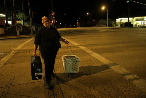 Firefighters and aircraft battle the Hughes Fire near Santa Clarita