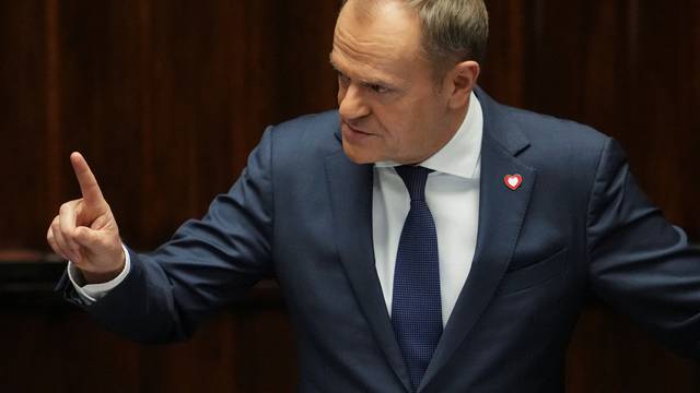 Newly appointed Polish PM Tusk presents government's programme in Warsaw