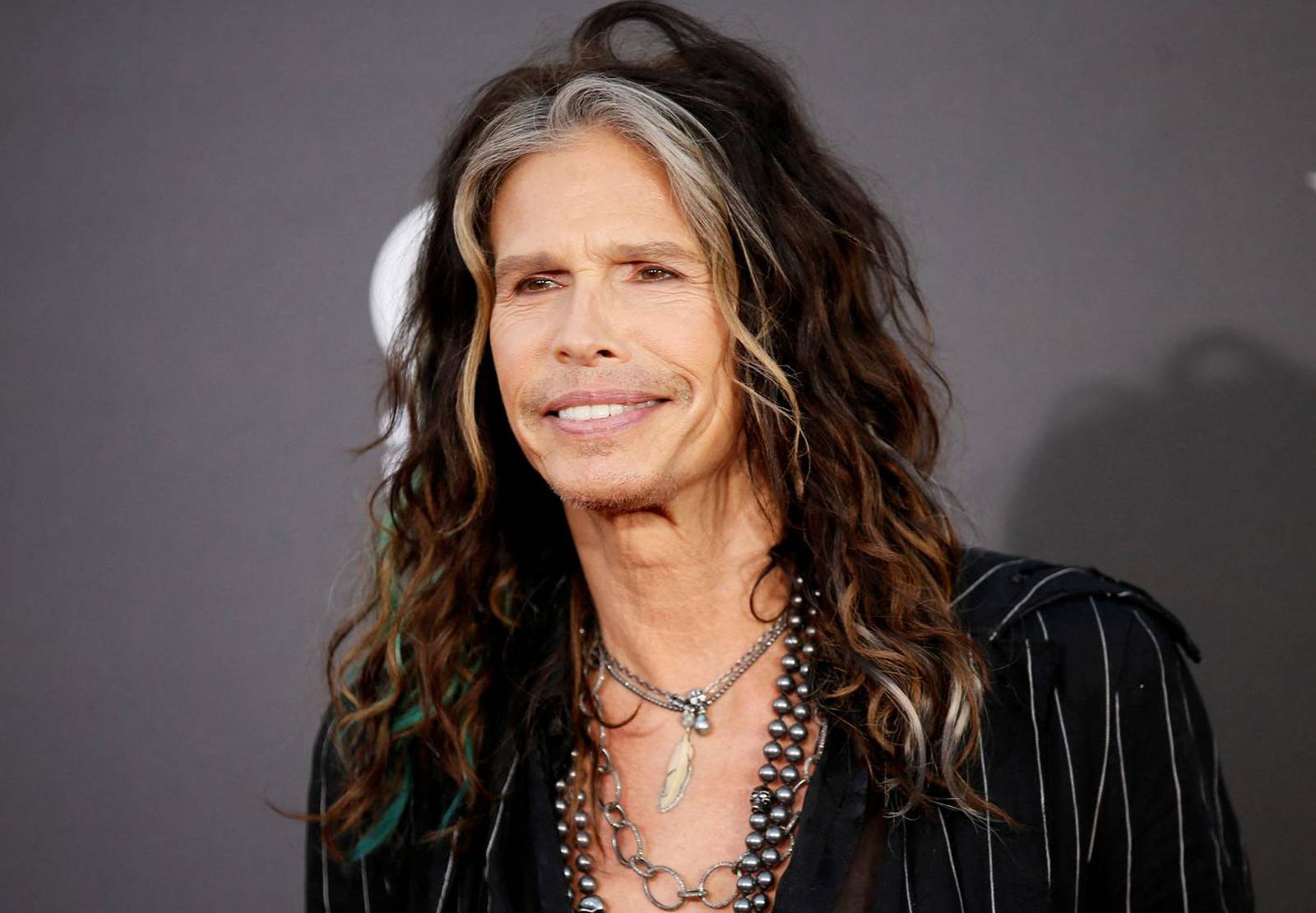 FILE PHOTO: Singer Steven Tyler of Aerosmith arrives at the Hollywood Film Awards in Hollywood