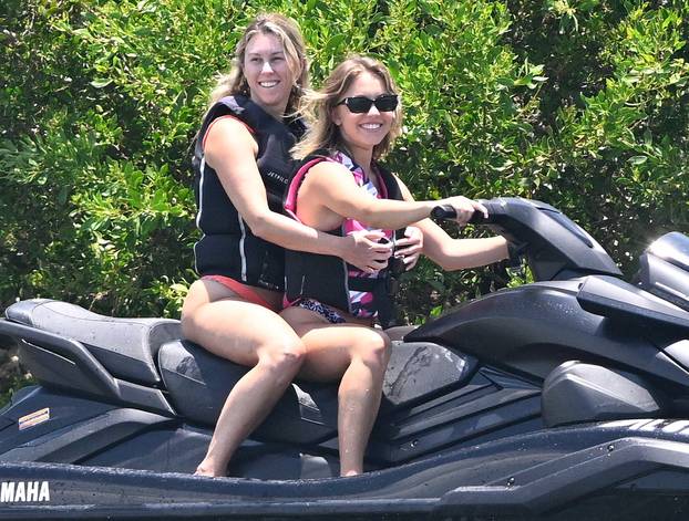 PREMIUM EXCLUSIVE: *NO WEB UNTIL 1PM EDT 10TH JUNE* Bikini-clad Sydney Sweeney is seen riding an inflatable banana pulled by a jetski off the back of her new Florida home