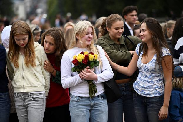 Mourners gather outside the Royal Palace, following the death of Norway's King Harald, in Oslo