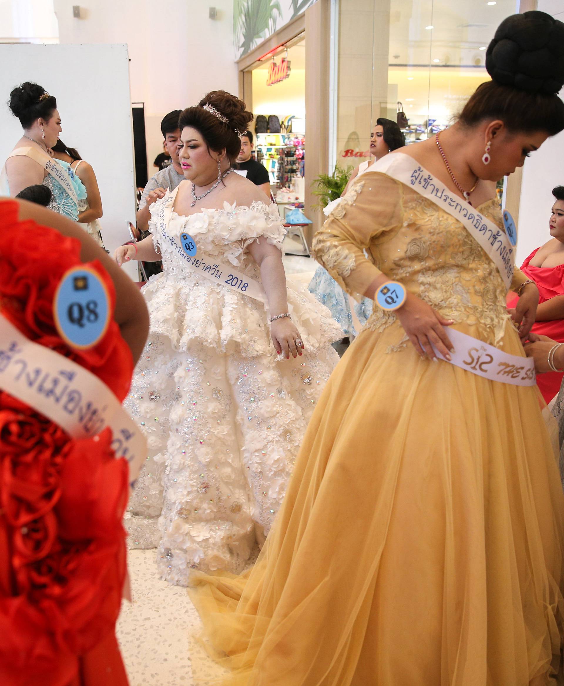 Participants prepare backstage before the final show of the Miss Jumbo 2018 at a department store in Nakhon Ratchasima