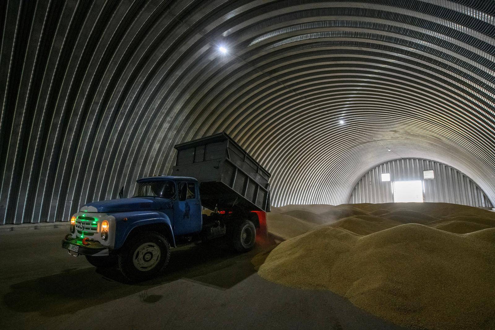 FILE PHOTO: Wheat harvesting in Kyiv region amid Russia's attack on Ukraine