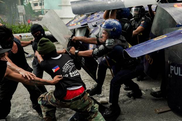 Filipinos protest to denounce what they say is corruption linked to flood control projects, in Manila