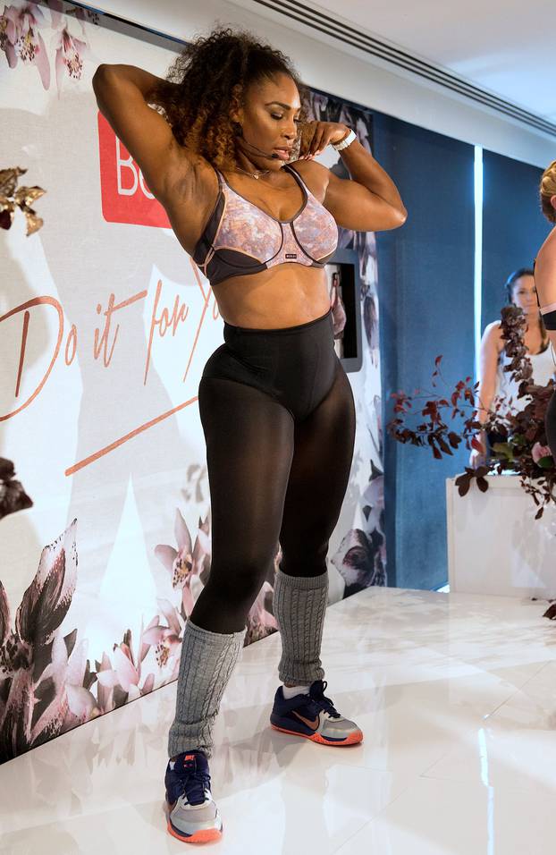 Tennis player Serena Williams of the U.S. dances during a promotional event for a new range of bras ahead of the Australian Open tennis tournament at hotel in Melbourne