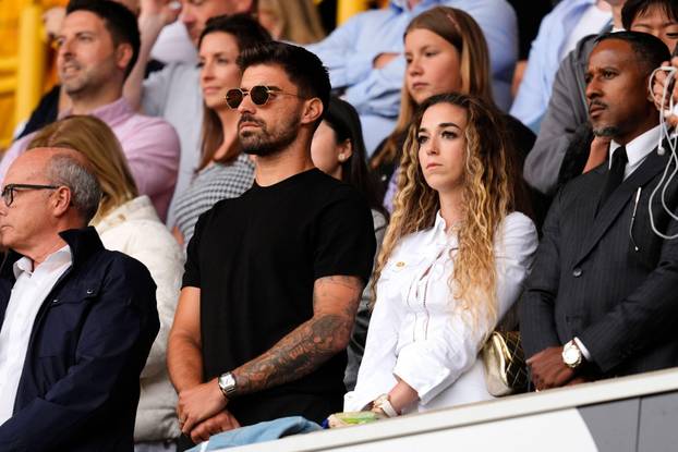 Rute Cardoso, wife of Diogo Jota, and former Wolverhampton Wanderers player Ruben Neves in the stand before the Premier League match at Molineux Stadium, Wolverhampton. Picture date: Saturday August 16, 2025.