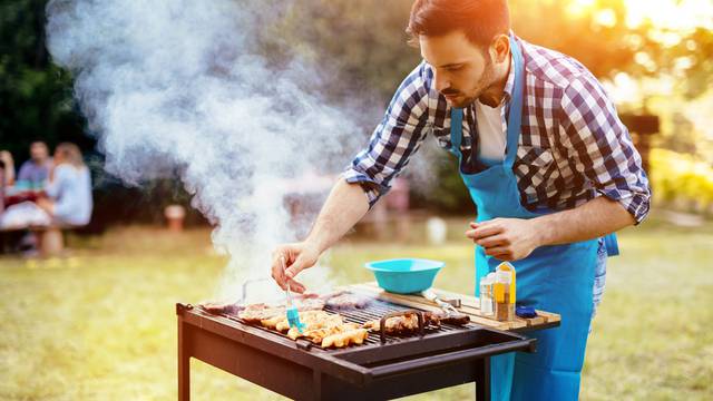 Handsome,Male,Preparing,Barbecue,Outdoors,For,Friends
