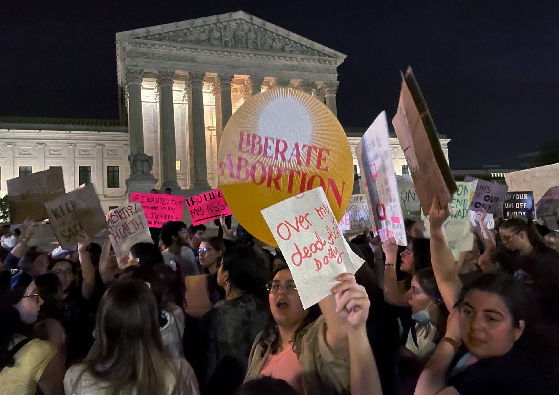 Protestors react outside the U.S. Supreme Court after the leak of a draft opinion preparing for a majority of the court to overturn the Roe v. Wade abortion rights decision in Washington