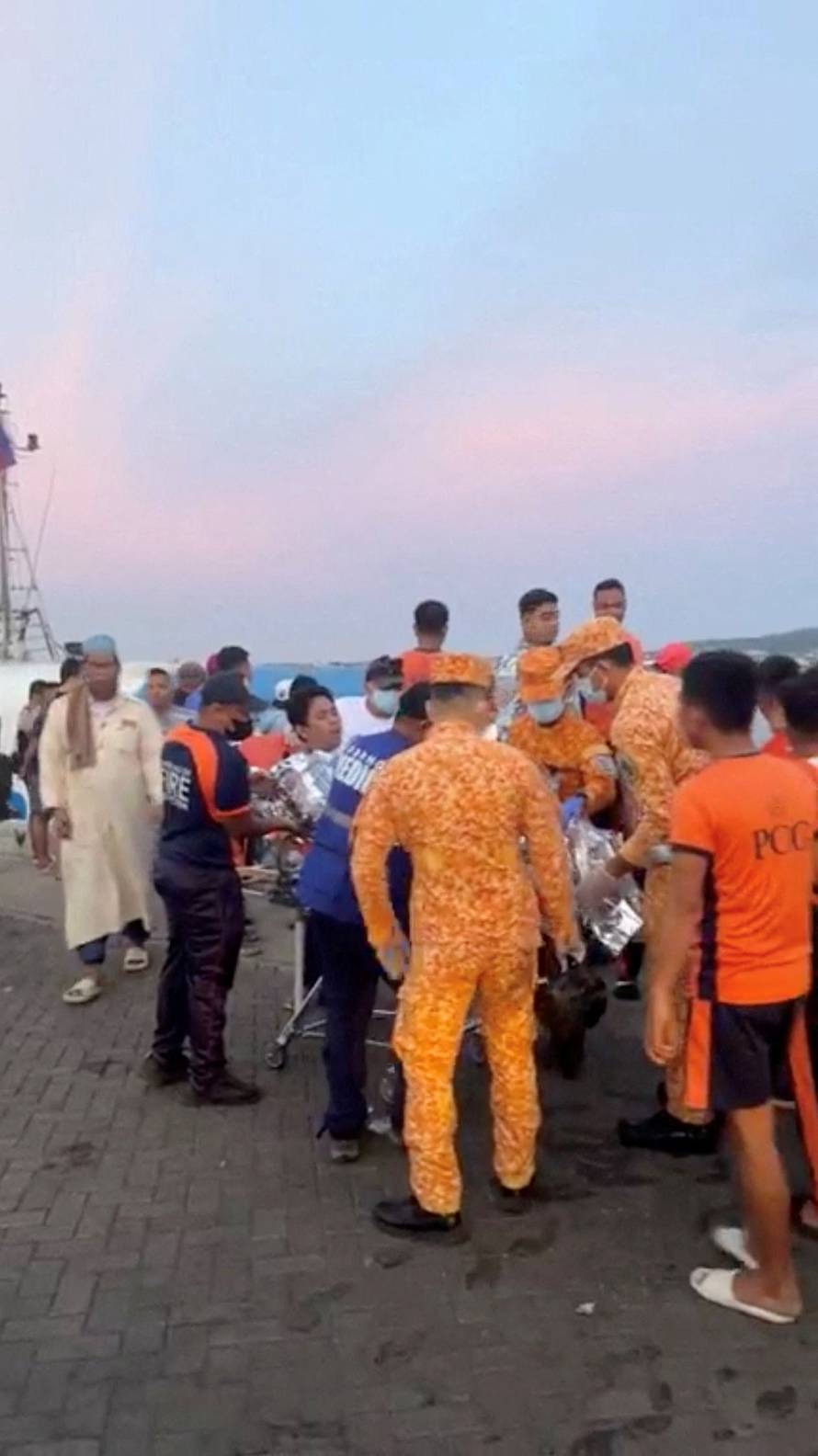 Emergency operations as victims of ferry capsize arrive in southern Philippines port