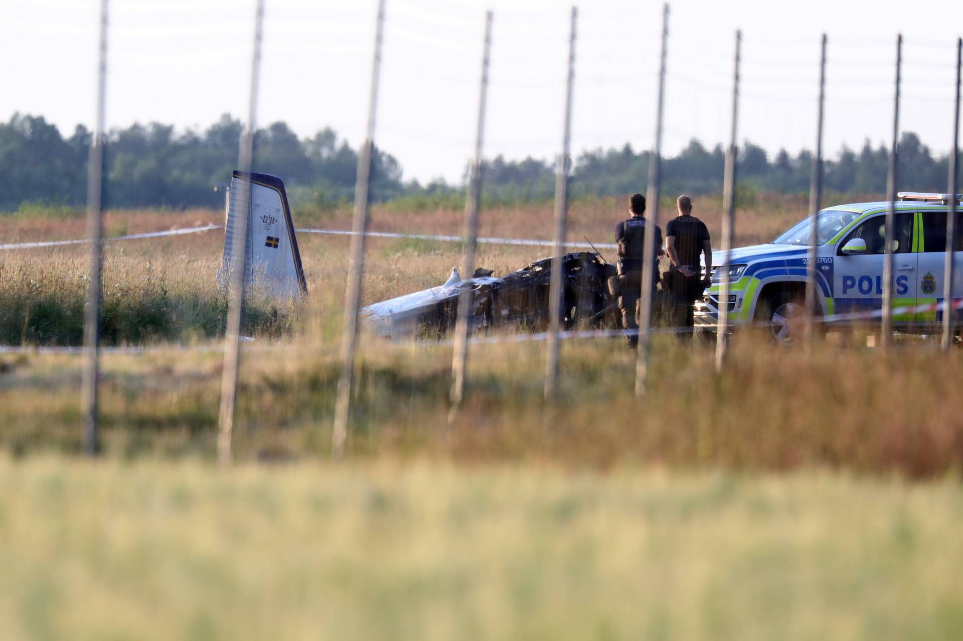 A small aircraft is seen after crashing at Orebro Airport in Sweden