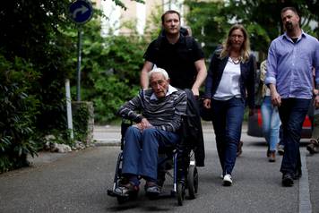 David Goodall, 104, arrives to hold a news conference a day before he intends to take his own life in assisted suicide, in Basel