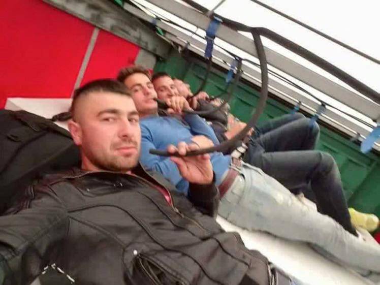 Brazen images show Albanians hiding in lorries and posing for 's