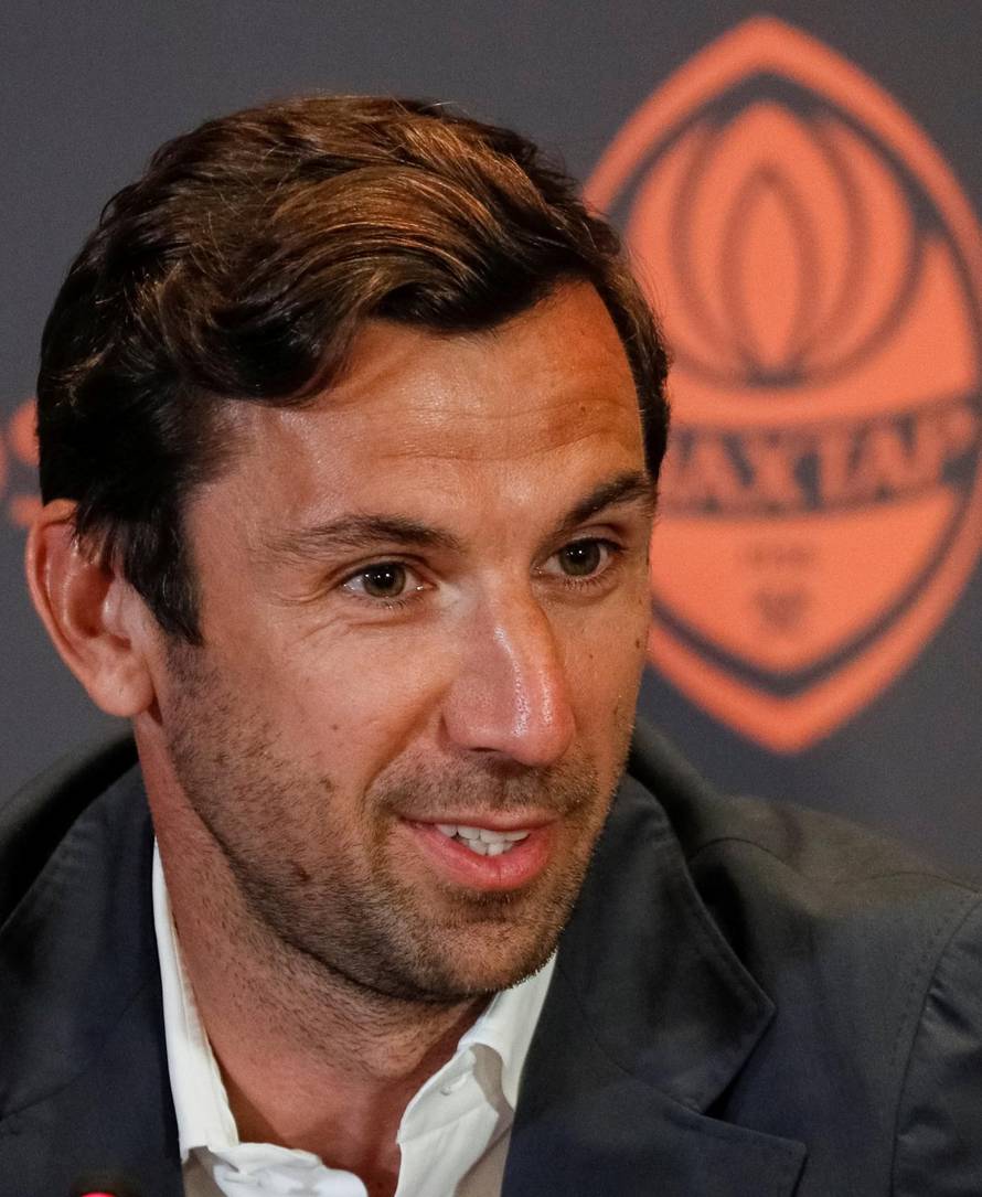 Former captain of Croatian national soccer team, Srna attends a news conference in Kiev