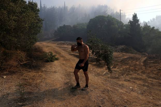 Wildfire burns near the village of Liti