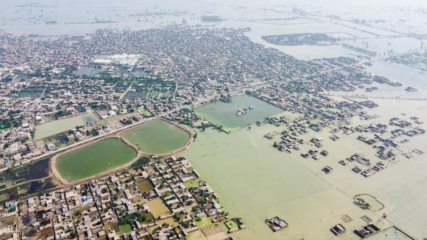 A general view of the submerged houses, following rains and floods during the monsoon season, in Dera Allah Yar